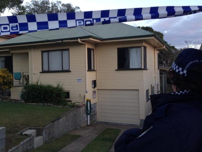 The house in suburban Brisbane where a man’s body was found badly burnt in a backyard shed.