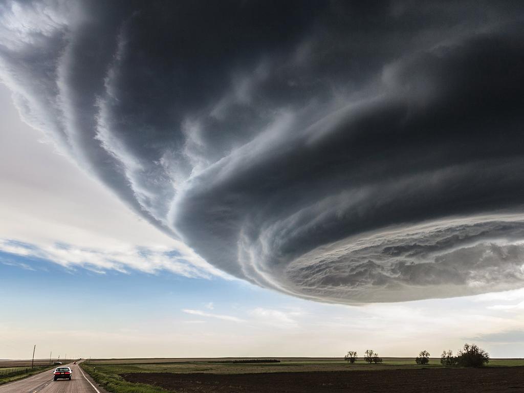 CHECK out the incredible winning pictures from this year’s National Geographic Traveler Contest. — Winner of the Grand Prize — “The Independence Day” by Marko Korosec / National Geographic Traveler Photo Contest While on storm chasing expeditions in the Tornado Alley in USA I have encountered many photogenic supercell storms. The storm was tornado warned for more than one hour, but stayed an LP storm through all its cycles and never produced a tornado, just occasional brief funnels, large hail and some rain. Location: Julesburg, Colorado, USA. Picture: <a href="http://travel.nationalgeographic.com/travel/traveler-magazine/photo-contest/2014" target="_blank">National Geographic Photo Contest </a>