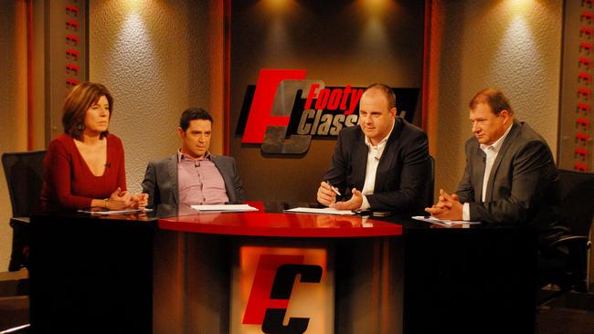 Caroline Wilson, Garry Lyon, Craig Hutchison and Grant Thomas on the set of Footy Classified