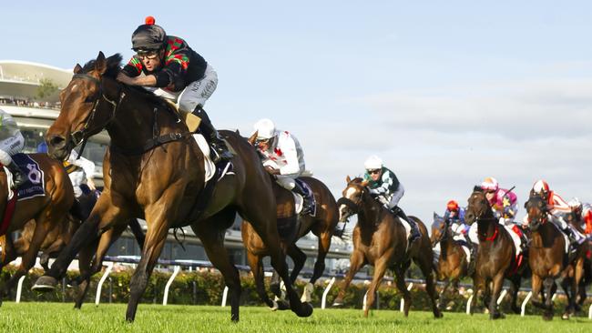 Jockey Billy Egan rides Defibrillate to victory at Flemington. Picture: AAP