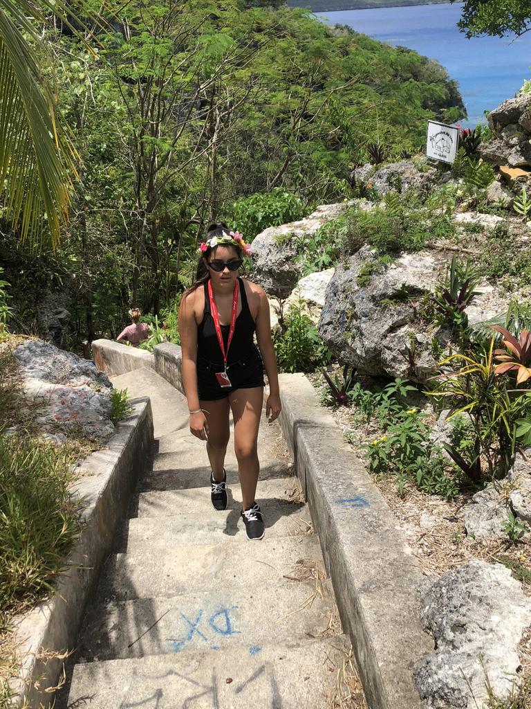 Ava Maguire walks the 188 steps back up from the ocean at Jokin Cliffs, Lifou in New Caledonia. Picture: Mercedes Maguire