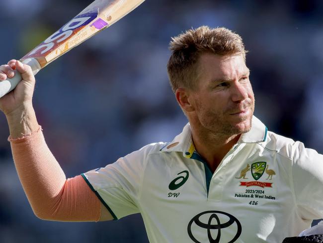 Australiaâs David Warner reacts after his dismissal for 164 runs on the first day of the first Test cricket match between Australia and Pakistan at Optus Stadium in Perth on December 14, 2023. (Photo by COLIN MURTY / AFP) / -- IMAGE RESTRICTED TO EDITORIAL USE - STRICTLY NO COMMERCIAL USE --