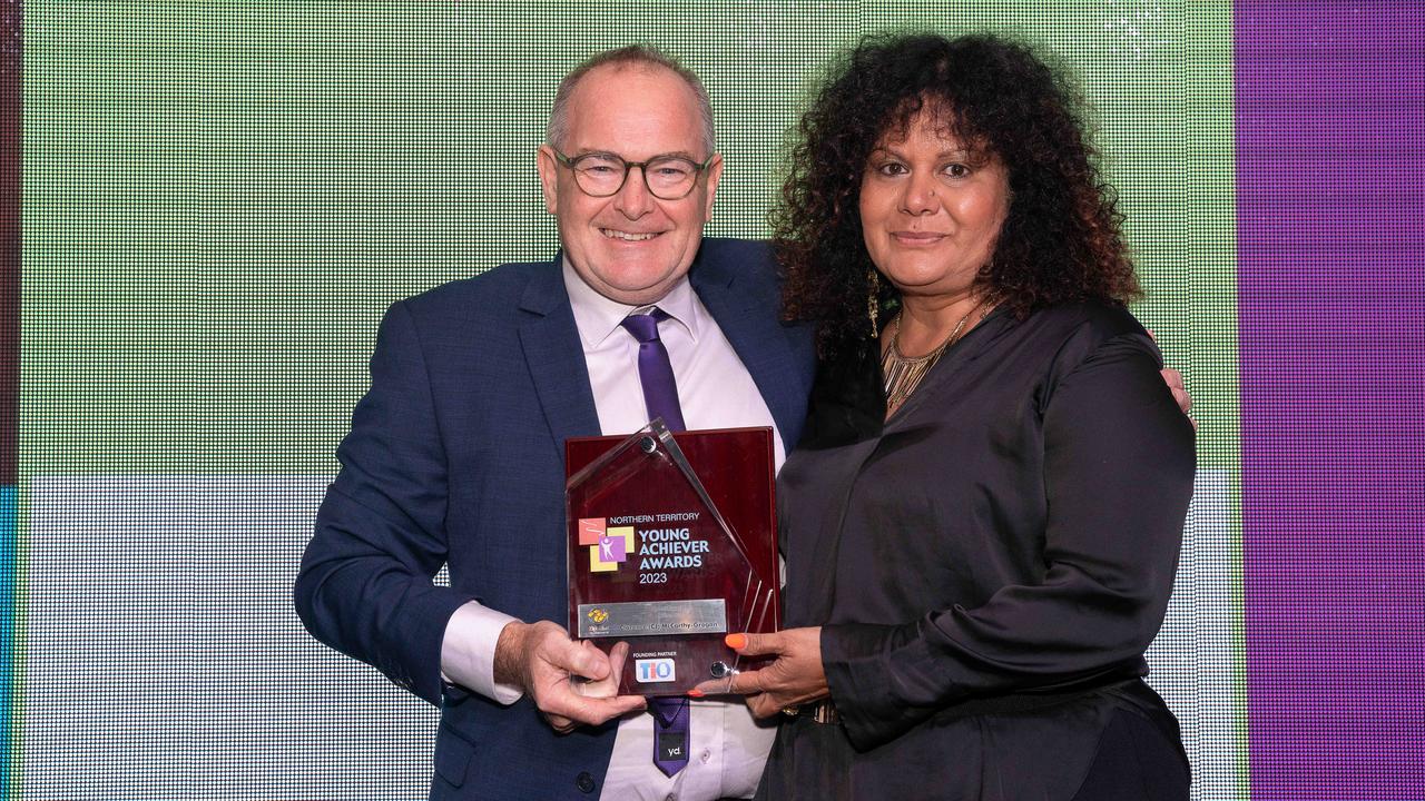 Malarndirri McCarthy receiving, on-behalf of her son CJ McCarthy-Grogan, the Zip Print Sport Award from Mark Teakle at the NT Young Achiever Awards. Picture: Pema Tamang Pakhrin