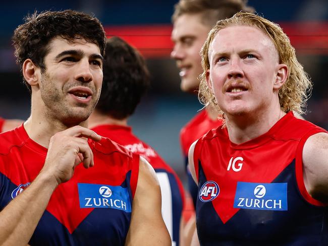 MELBOURNE, AUSTRALIA - APRIL 29: Clayton Oliver and Christian Petracca of the Demons are seen during the 2023 AFL Round 07 match between the Melbourne Demons and the North Melbourne Kangaroos at the Melbourne Cricket Ground on April 29, 2023 in Melbourne, Australia. (Photo by Dylan Burns/AFL Photos via Getty Images)