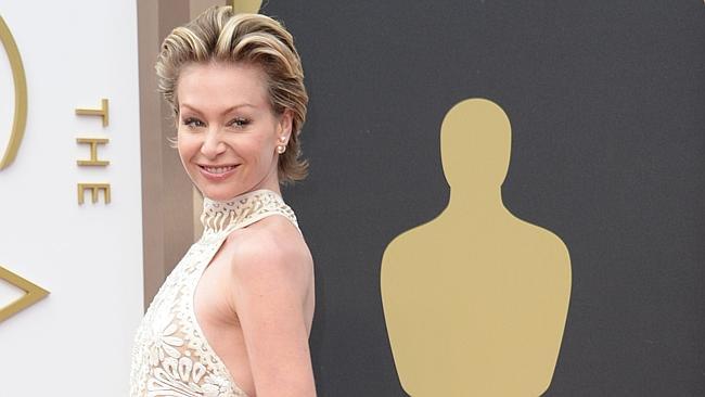 Portia de Rossi arrives on the red carpet for the 86th Academy Awards.