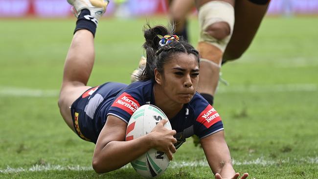 Jasmine Peters of the Cowboys scores a try during the round seven NRLW match between North Queensland Cowboys and Wests Tigers at Queensland Country Bank Stadium. (Photo by Ian Hitchcock/Getty Images)