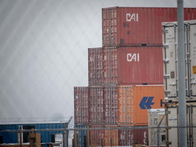 Shipping containers are seen in the Port of Montreal in Montreal, Canada, on February 3, 2025. US President Donald Trump paused tariffs on Mexico for one month after last-minute talks Monday -- but there was no breakthrough yet in negotiations with Canada on an issue that has sparked fears of a global trade war. (Photo by ANDREJ IVANOV / AFP)