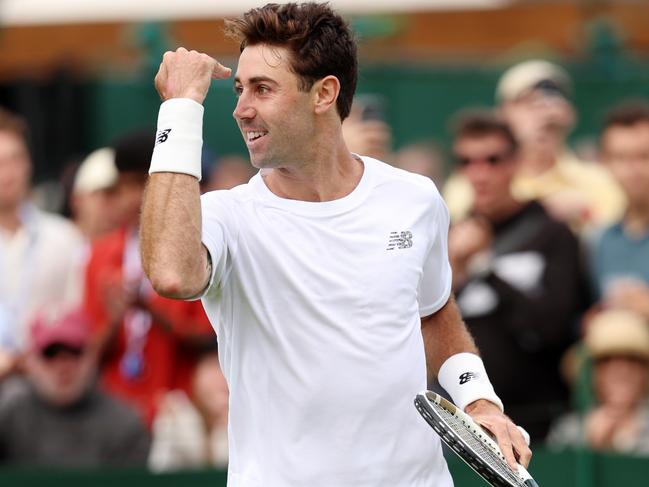 LONDON, ENGLAND - JULY 03: Jordan Thompson of Australia celebrates winning match point against Brandon Nakashima of United States in the Men's Singles first round match on day one of The Championships Wimbledon 2023 at All England Lawn Tennis and Croquet Club on July 03, 2023 in London, England. (Photo by Clive Brunskill/Getty Images)