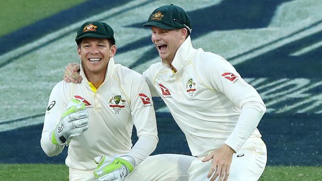 Tim Paine and Steve Smith during the first Ashes Test at the Gabba in 2017. Picture: Getty Images