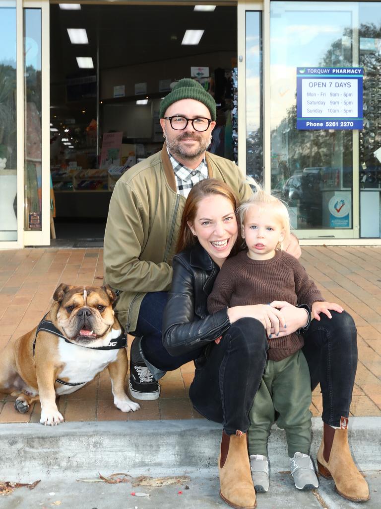 Marty Cooper with Juliet Adelstein and their son Forrest and dog Boston outside the Torquay Pharmacy. Picture: Alison Wynd