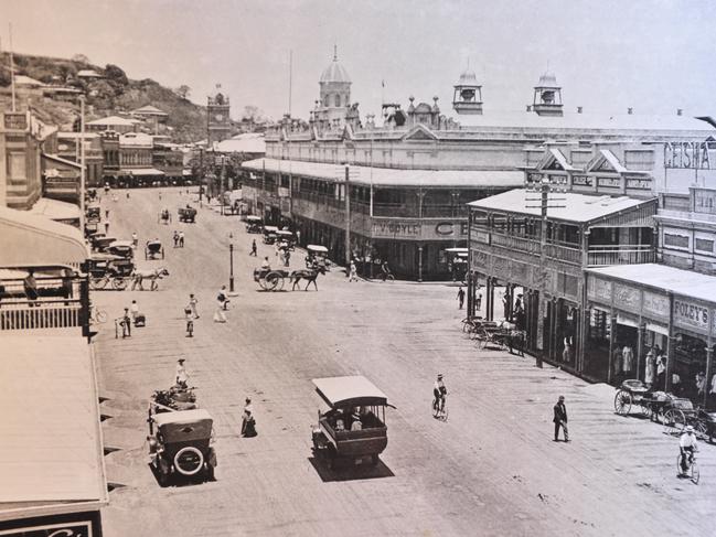 Flinders St Townsville Historical supplement. Photo 32 The Market Reserve Buildings about 1924 (Photograph Private Collection) In 1900, the new Town Hall was nearly completed. As this later photograph shows, it was the largest structure in the street for many years. It was in fact a complex that comprised not only the Town Hall with space for rented shops and offices, but also the Central Hotel at the corner of Stokes Street and the Theatre Royal next to it. An arcade provided an entrance to the market area at the rear. Though only two stories in height, it was an impressive building .A wide verandah enclosed with iron lace balustrading shaded the fa�ade, extending around the Stokes Street frontage. In recent times it has been recognised that