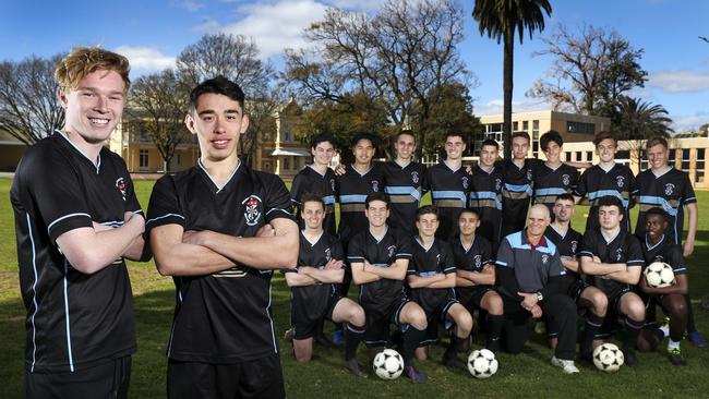 Young Socceroos and Adelaide United Youth players Jai King-Byrne and Luis Lawrie-Latanzio with Blackfriars team members and Ernie Luongo. Picture SARAH REED