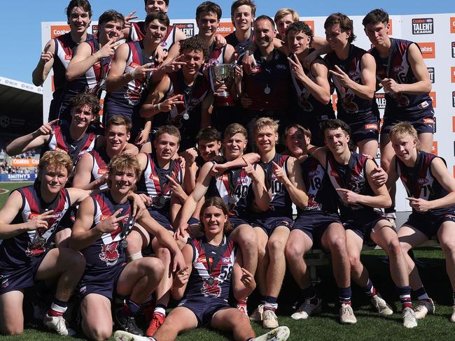 MELBOURNE, AUSTRALIA - SEPTEMBER 24: Sandringham Dragons players celebrate winning the premiership during the Coates Talent League Boys Grand Final match between Sandringham Dragons  and Eastern Ranges at Ikon Park on September 24, 2023 in Melbourne, Australia. (Photo by Kelly Defina/AFL Photos/via Getty Images)