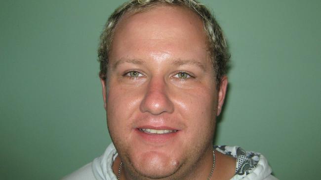 Jennings in a police-issued photograph when he was wanted in 2011 over the tying up and robbery of a man in an inner-city Sydney unit.