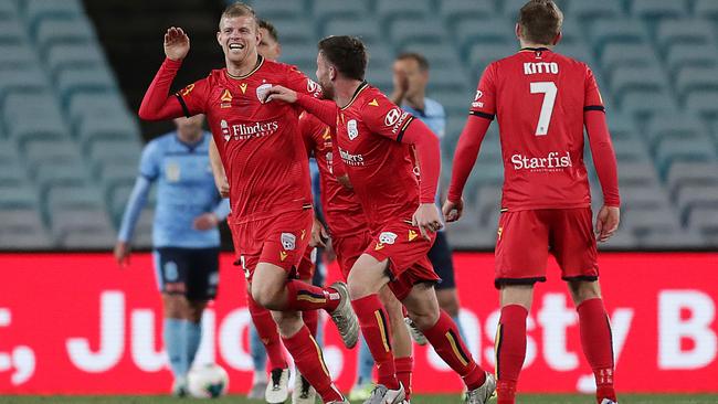 Adelaide’s Jordan Elsey celebrates his goal against Sydney FC at ANZ Stadium on Thursday night. Picture: Getty Images