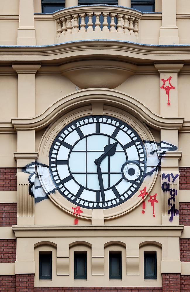 A man has been charged over the Pam the Bird attack on Flinders Street Station clock. Picture: Ian Currie