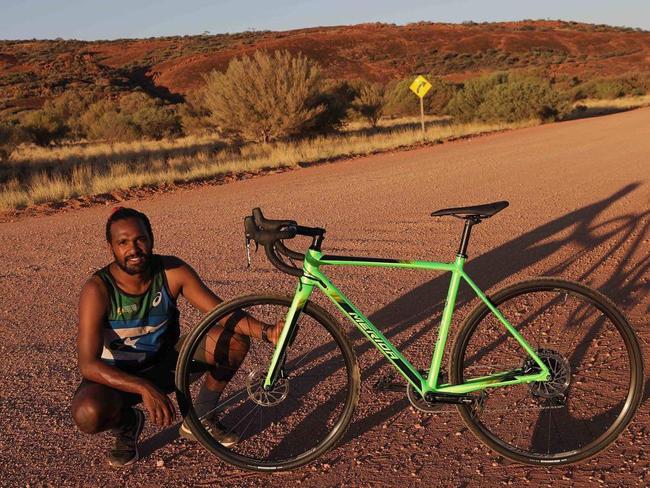 Marathon runner Zibeon Fielding rode around the APY Lands to raise money for a community gym. Picture: Indigenous Marathon Project.