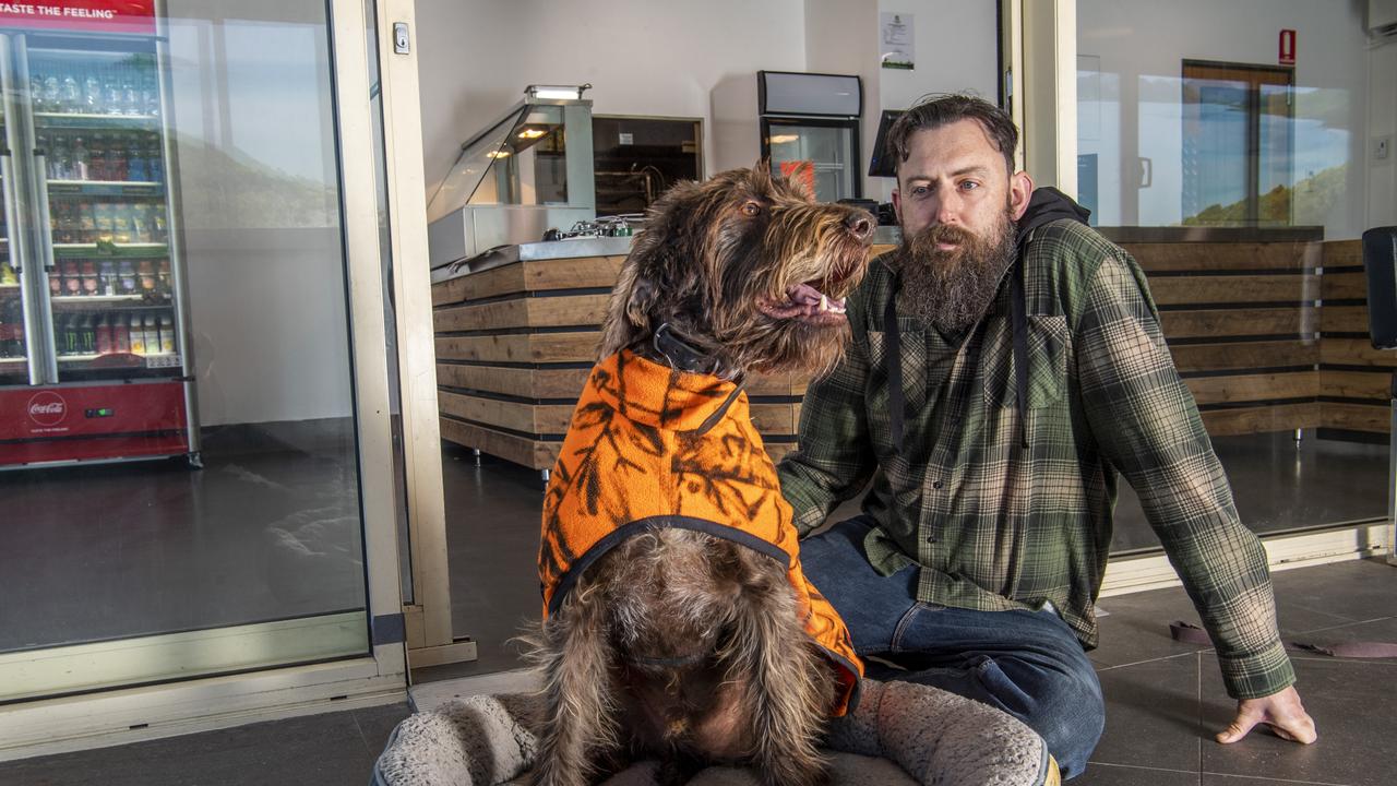 Floyd's Takeaway, Floyd the dog has his own takeaway shop named after him at the Range shopping centre. Pictured with owner Matt Halse. Thursday, July 22, 2021. Picture: Nev Madsen.