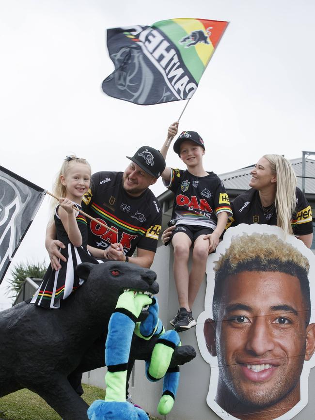 Footy fans, Amy and Ben Christie, pictured with their kids Matilda, 6 and Charlie 8. Picture: David Swift