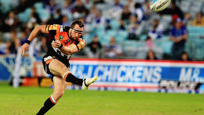 Pat Richards of the Tigers kicks a 55 metre penalty on half time during the Canterbury Bulldogs v Wests Tigers NRL round 8 game at ANZ Stadium, Homebush. pic Mark Evans