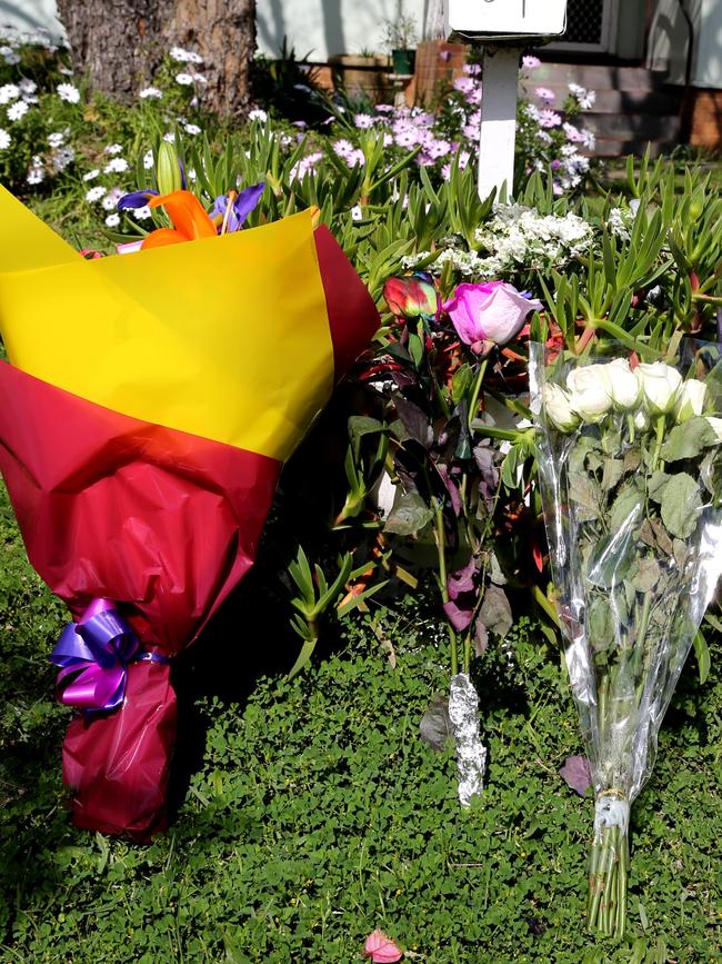 Flowers left outside the house.