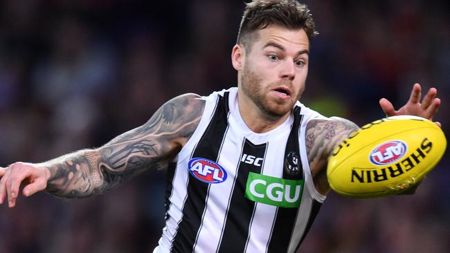 Jamie Elliott in full flight for the Magpies. Picture: AAP