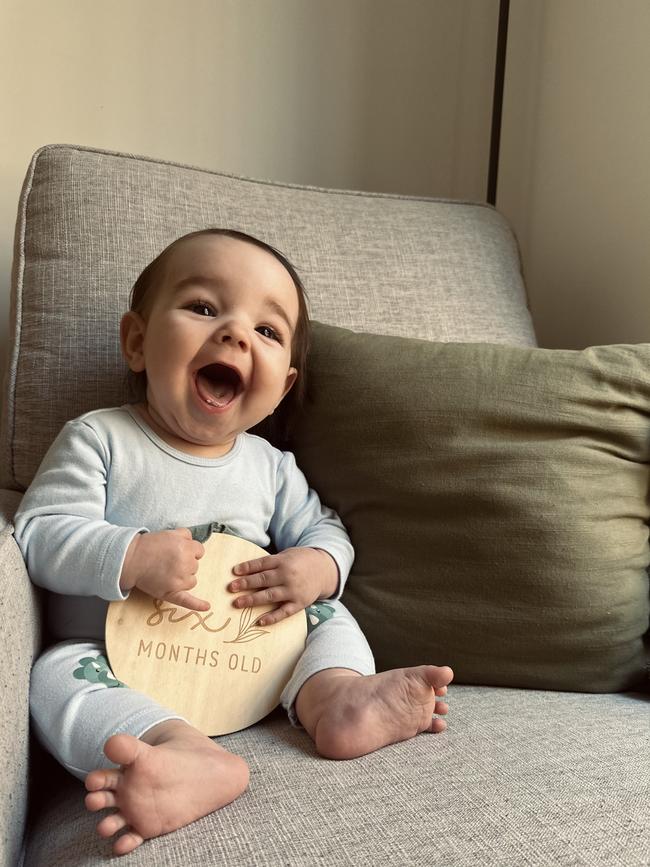 Beau Thomsen. Six months old. Beau is a cheeky happy little boy, he loves to wave and babble to everyone he sees. Hes constantly on the move, wanting to play and loves a good cuddle.
