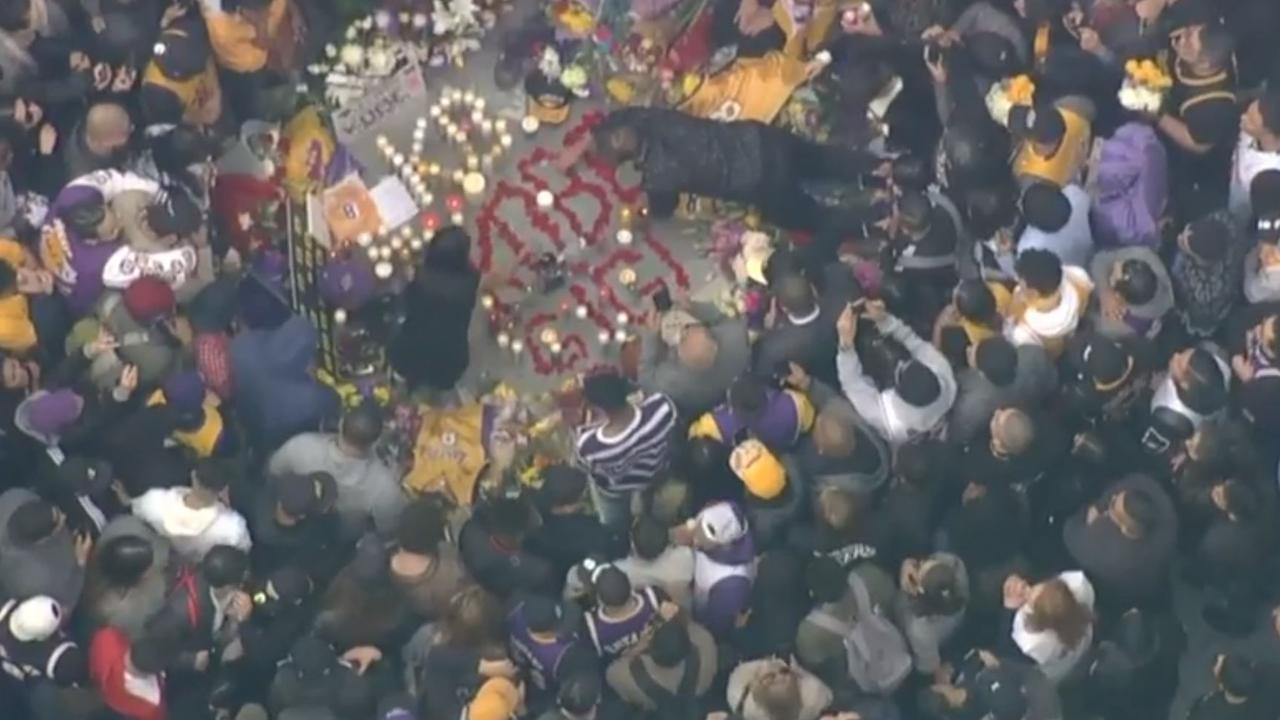 A huge crowd gathers at the Staples Center.