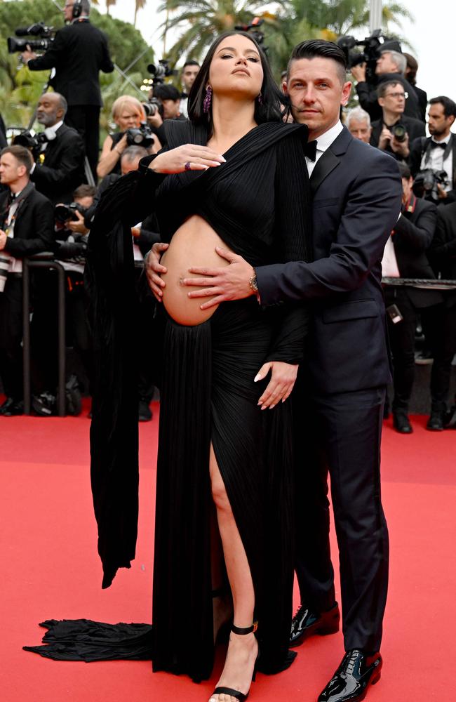 Pregnant Adriana Lima posed with her partner, US film producer Andre Lemmers. Picture: Patricia De Melo Moreira / AFP