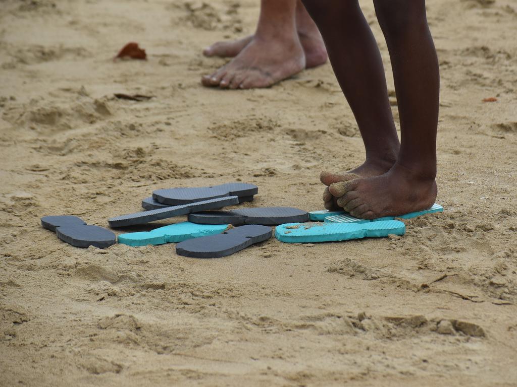 Thong-throwing at the Mackay & District South Sea islander Association's 2022 Australia Day Celebrations in Quota Park. Picture: Lillian Watkins generic