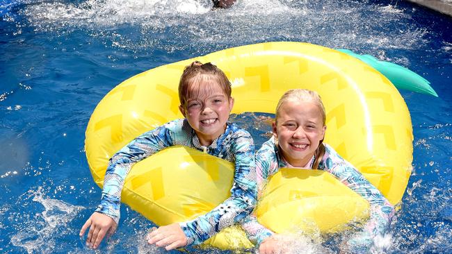 Ruby Fuller with best friend Olivia kept their cool in the pool in Klemzig. Picture: Naomi Jellicoe