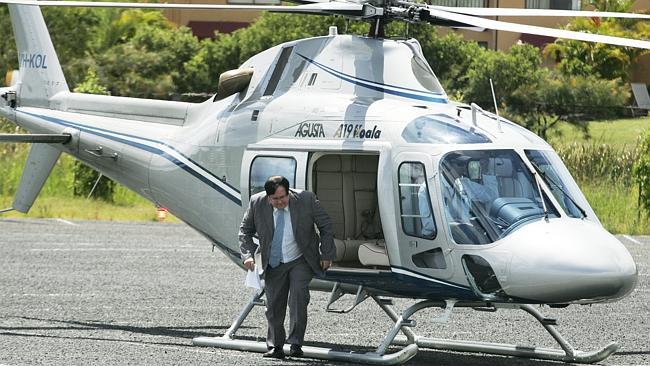  Gold Coast United Soccer team owner Clive Palmer arrives at Skilled Stadium in his private helicopter. 