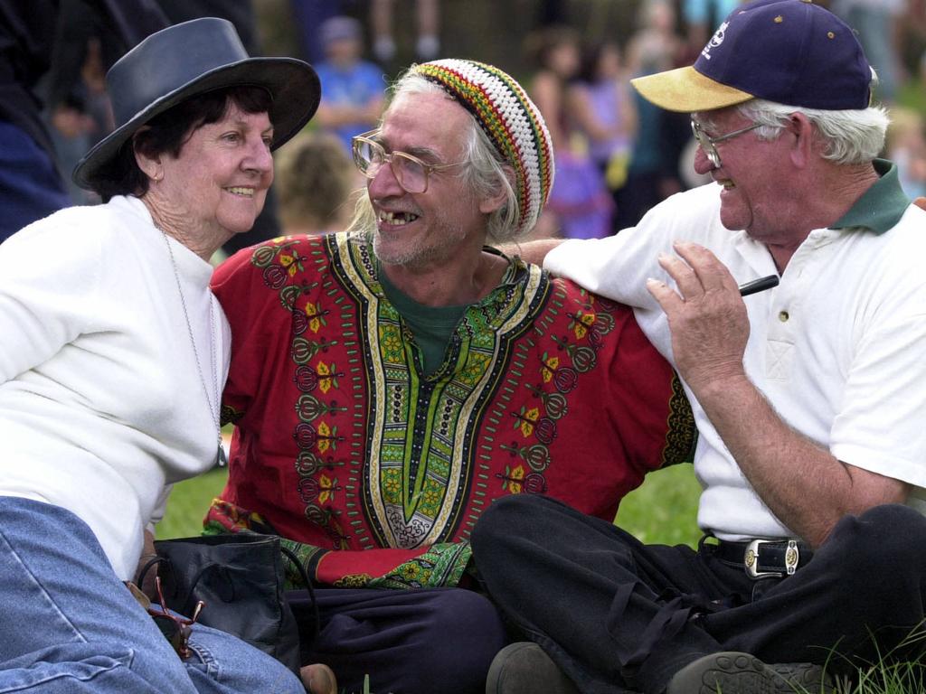 Like old times, Alan Evans 47 (c), with his mum and dad Mae 71 and Mick 73, Mae and Mick from sunurban Brisbane noiw accpet Alan after all these years asHippies converge at Tha Channon for a 30th anniv. of the Aquarius Festival near Nimbin NSW. pic Lyndon Mechielsen 11/5/03