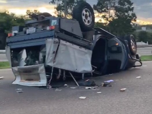 A vehicle has rolled on the Bruce Highway at Burdell. Source: Facebook