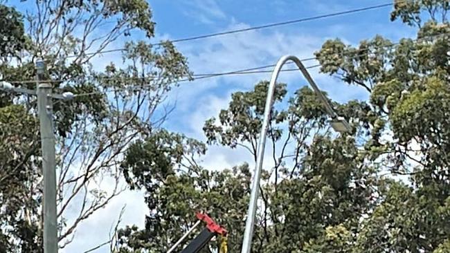 Energex has been called in to cut power to the wires after a man hit them and suffered an electric shock.