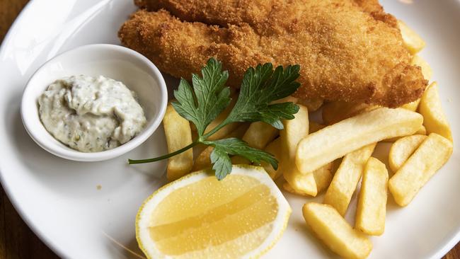 Crumbed fish fillet of the day with chips on the side and tartare sauce. Picture: Mark Cranitch.