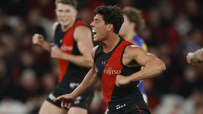 MELBOURNE, AUSTRALIAÃ June 23 , 2024.  AFL Round 15. Essendon vs West Coast Eagles at Marvel Stadium.   Jye Caldwell of the Bombers celebrates a 4th quarter goal   . Pic: Michael Klein