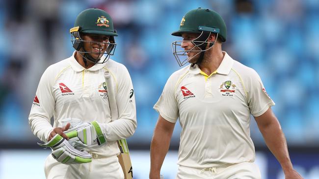 Usman Khawaja and Aaron Finch made 30 runs between them in 13 overs on day two in Dubai. Picture: Getty Images