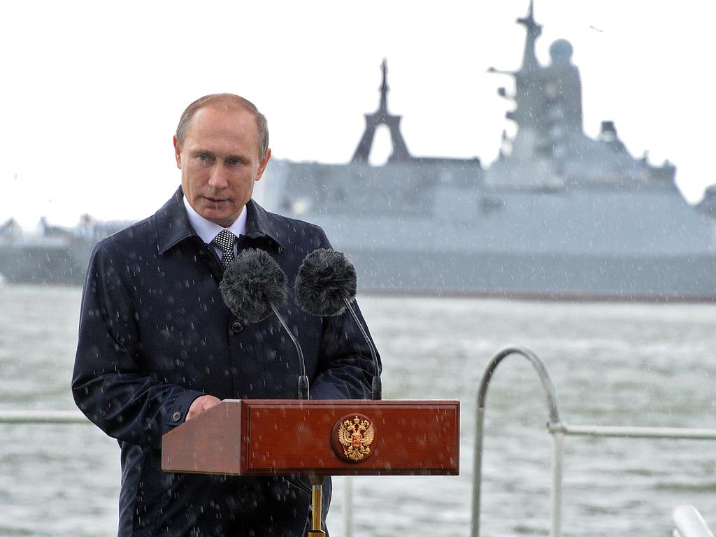 Russian President Vladimir Putin delivers a speech under the rain during celebrations for Navy Day in Baltiysk in the Kaliningrad region. Picture: AFP