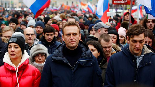 Russian opposition leader Alexei Navalny stands between his wife Yulia and brother Oleg during a rally in Moscow, Russia on February 24, 2019. Picture: Sefa Karacan/Anadolu Agency/Getty Images