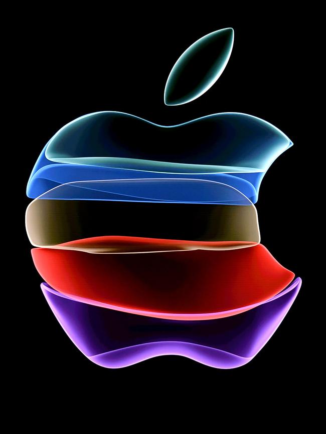 The Apple logo is projected on a screen before the start of a product event last year. Picture: AFP