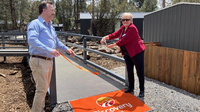 G’day Group chief strategy officer Ben Simons and Kentish Mayor Kate Habrele cutting the ribbon for the new $20 million redevelopment at Discovery Parks – Cradle Mountain. Picture: Simon McGuire.