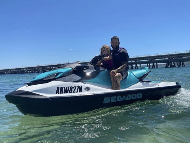 Rabbitohs halfback Adam Reynolds with his daughter Zariyaa jetskiing off Kurnell. Picture: Supplied