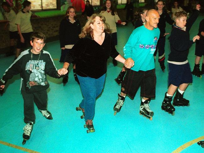 A coast family enjoying the rink in 2002. Picture: Peter Clark