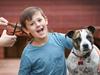 9 year old Leo Saw wants to help animals so he hopes he can raise some money by chopping off his much loved mullet. He has two dogs and wants all doggos to be safe and in warm homes so he started this fundraiser for the Lost Dogs Home. Leo prepares to chop his locks with his dog Elly.                      Picture: David Caird
