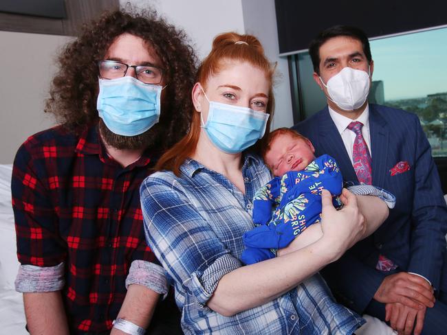 Emma and Brent Whittaker with baby Sam and Dr Sam Sabary.St John of God Geelong Hospital have become the first hospital in the greater Geelong area to birth a baby by an emerging technique known as a Maternal Assisted Caesarean Section. The procedure allows the mother to physically remove her baby from the uterus while under a spinal anaesthetic and allows for intimate bonding between a mother and baby within seconds of birth. The baby was safety born on 3 September thanks to his mum and the support of Obstetrician and Gynaecologist Dr Sam Sabary. Picture: Alan Barber