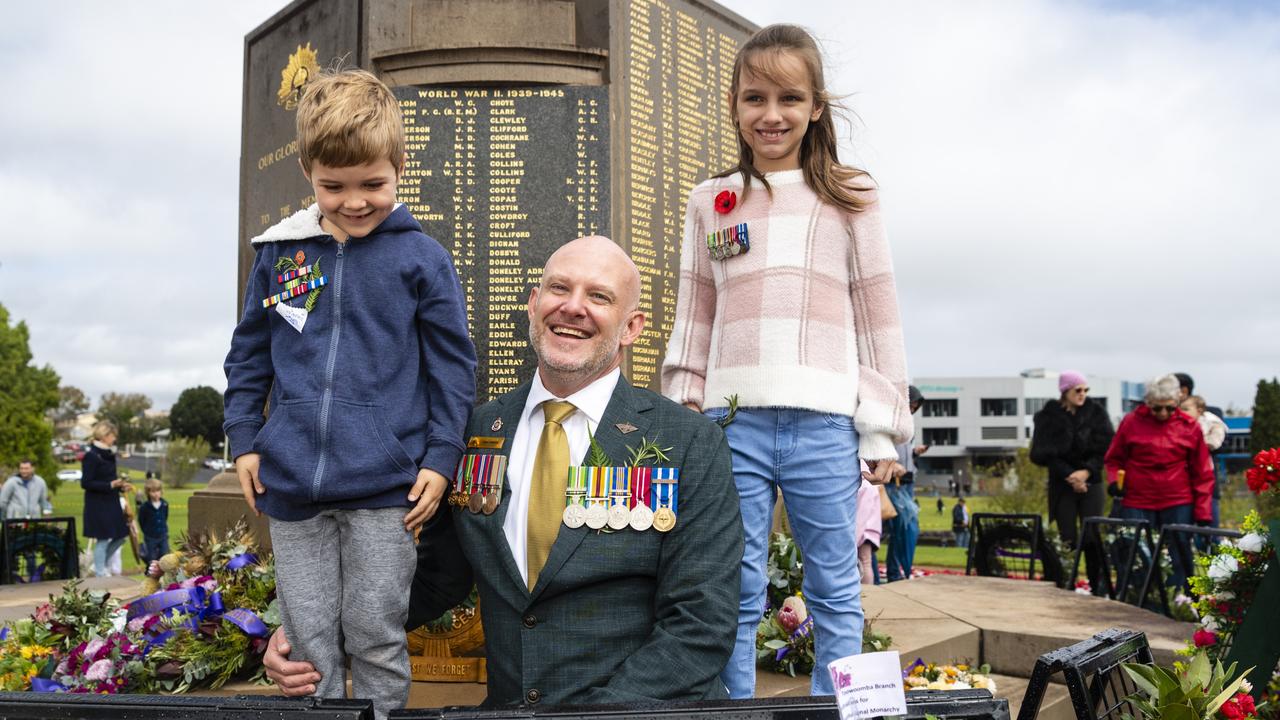 Retired Major Dan O'Mara with his nephew Joel Moore and niece Louise O'Mara after showing them the name of his great uncle, Thomas Bryan killed at Milne Bay, inscribed on the Mothers' Memorial after the Citizens Commemoration Service on Anzac Day, Monday, April 25, 2022. Picture: Kevin Farmer