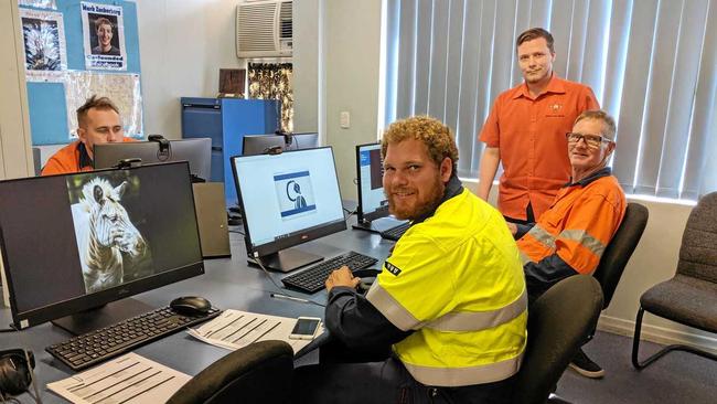 HELPING OUT: Jamaine Miller (back right) is able to assist with more courses now that Abbot Point Operations has helped fund his wage for the next year. Picture: Supplied