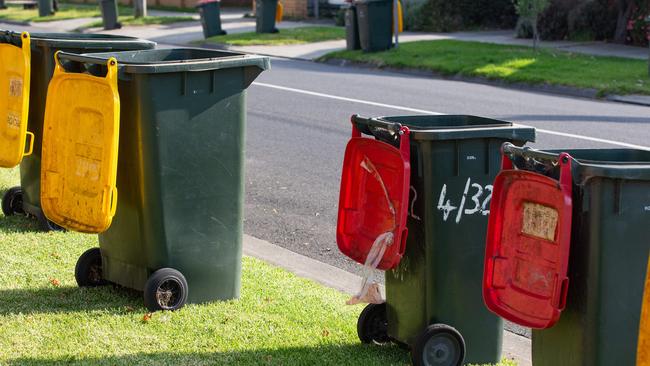 The top three recyclables that end up in the red-top wheelie bin instead of the yellow-top recycling bin are paper or magazines, packaging like cereal boxes and glass bottles. 