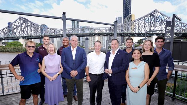 Lord Mayor Adrian Schrinner (centre, white shirt) at a tourism anouncement at Howard Smith Wharves on March 18 where he talked about the Story Bridge. Picture: Steve Pohlner